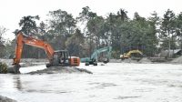 Sejumlah excavator mulai mengeruk Sungai Masamba, Sabtu (1/8/2020).