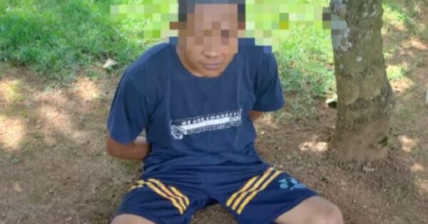 K (31) terduga pelaku pembunuh ayahnya sendiri dengan cara memenggal kepala korban, di Lampung.