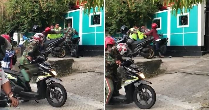 Tangkapan layar video perkelahian dua anggota polisi melawan satu prajurit TNI.